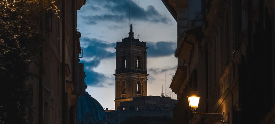 Team collaborating with laptops in a modern workspace